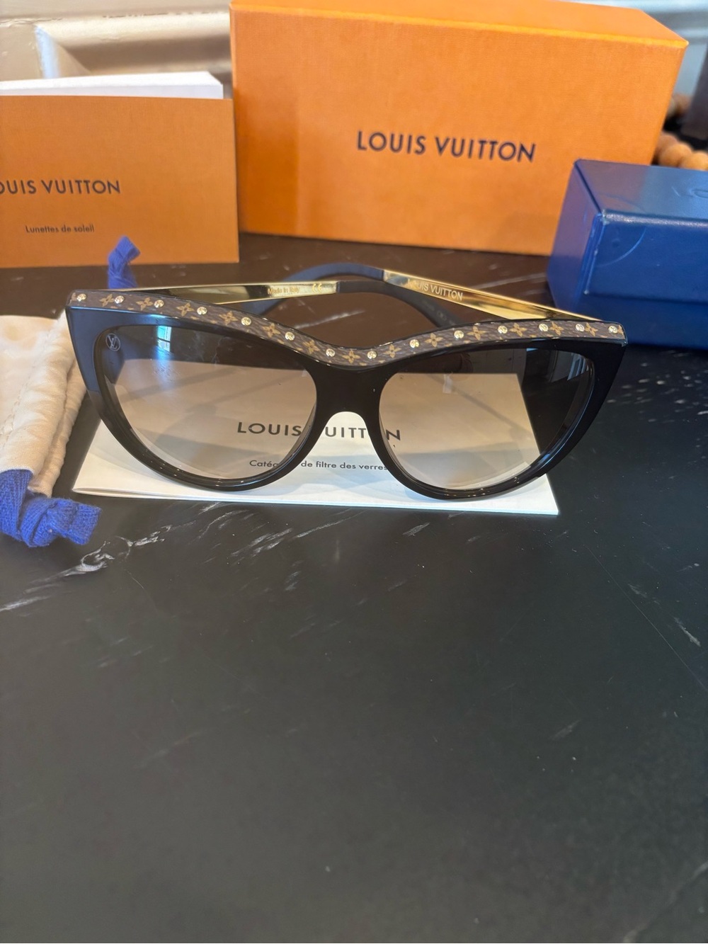 Louis Vuitton brown cat-eye sunglasses with gold stud accents. - Picture 12 of 12